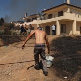 Très prisée par les vacanciers grecs et étrangers, la région de Thymari comprend de nombreuses maisons secondaires d'Athéniens. KEYSTONE/EPA/GEORGE VITSARAS